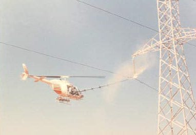 Washing-of-HV-line-by-helicopter Washing-of-HV-line-by-helicopter Washing-of-HV-line-by-helicopter insulator Australian Utility Confronted Insulator Pollution Washing of HV line by helicopter