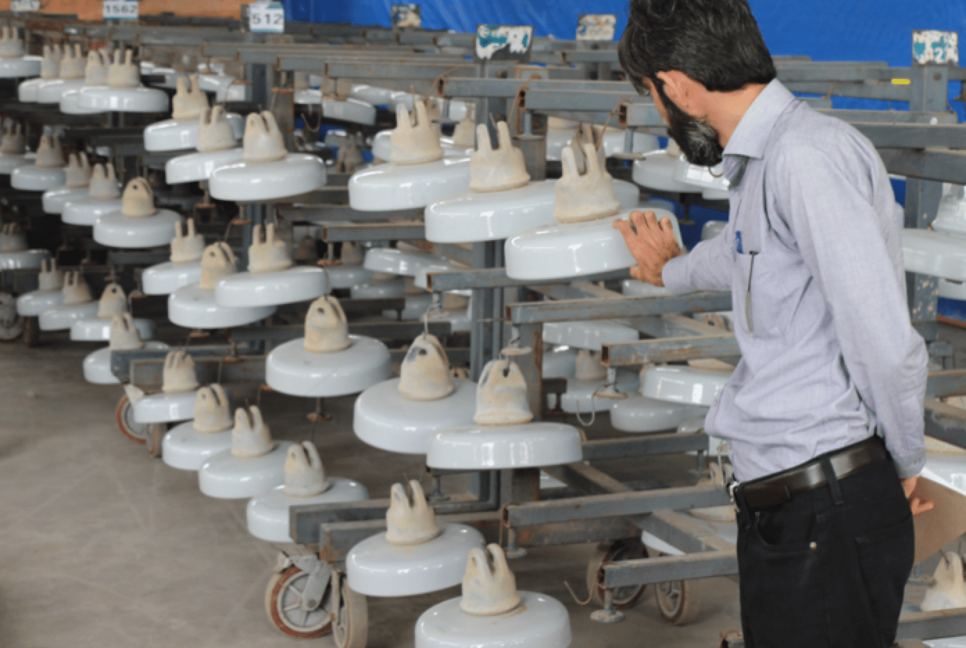 Insulators-removed-from-lines-are-cleaned-and-readied-for-coating-with-RTV-silicone-material-1 Insulators-removed-from-lines-are-cleaned-and-readied-for-coating-with-RTV-silicone-material-1 Expanding Grid in Pakistan Confronts Challenges of Pollution, Icing & Lightning (Part 1 of 2) Insulators removed from lines are cleaned and readied for coating with RTV silicone material 1