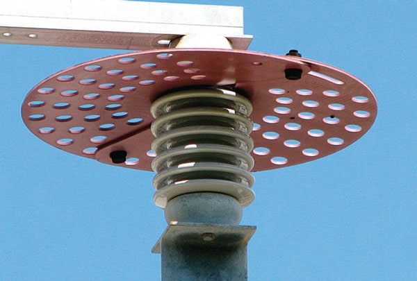 Fig93 Fig93 Figure 9: Barrier type WPD mounted too close to the high voltage. arrester Wildlife Protective Devices for Arresters Fig93