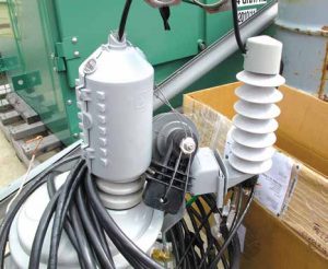 Example of new transformers and arresters arriving with wildlife protective devices preinstalled in factory.