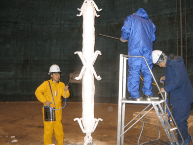 Fig. 13: Spraying water onto snow accreted insulator.