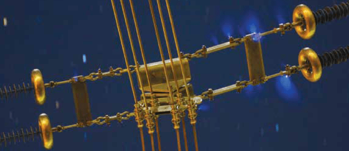 Example of corona from high E-field acting on metal fittings.