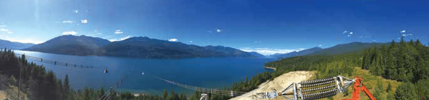 62 ft. (19 m) towers on east side of lake stand on rocky outcrop some 1300 ft. above Lake Kootenay.