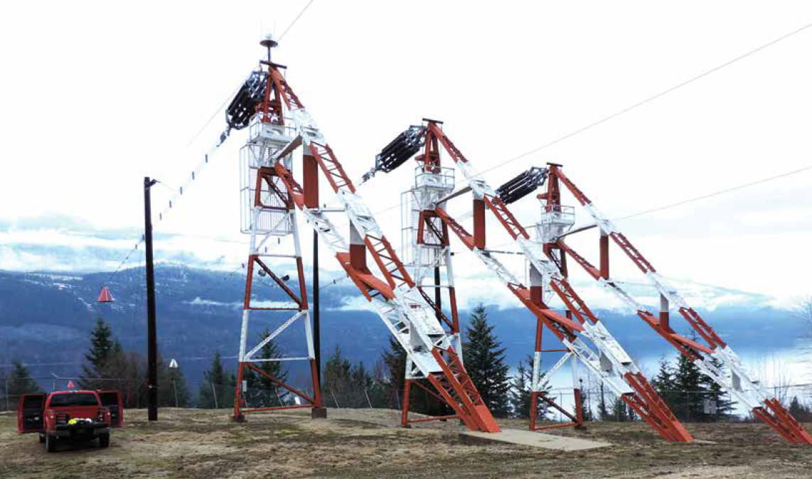 Single phase towers on east side of lake relocated in 1962 to higher elevation and replaced original 3-phase tower destroyed by bombing.
