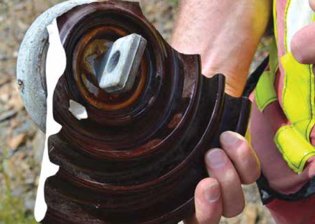 Original bell from 1952 was found damaged, possibly due to power arc or gun vandalism (photo left).