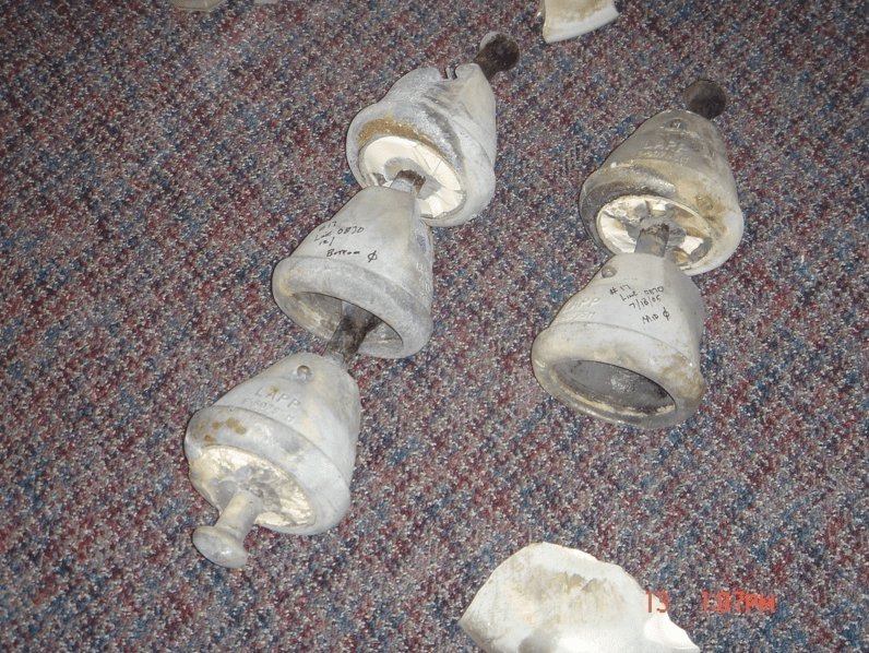 Fig. 5: De-capping of porcelain insulators on 115 kV insulator string.