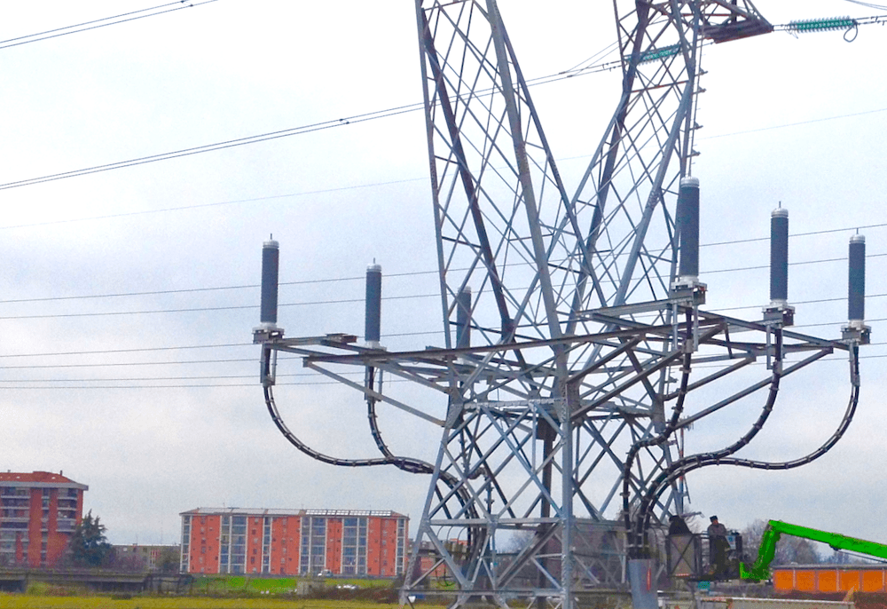 245 kV cable termination system installed near highway.
