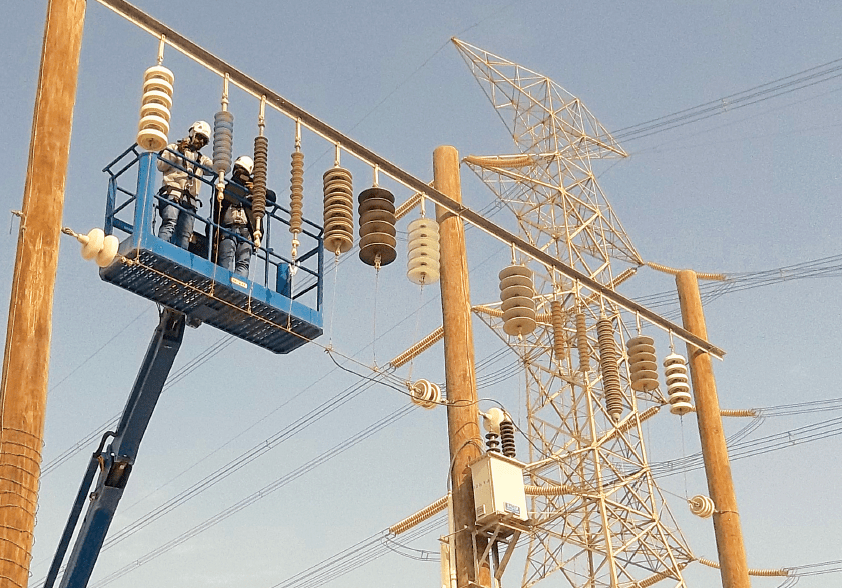 Insulators being inspected at Al-Fadhili Insulator Test Station Performance