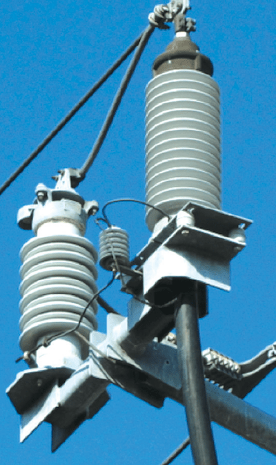Transmission-line-riser-pole-arrester-left-and-SVL-center Transmission-line-riser-pole-arrester-left-and-SVL-center arrester Technology & Application Review of Arresters that Extend Life of Cables Transmission line riser pole arrester left and SVL center
