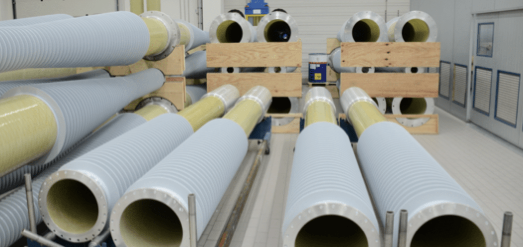 Tubes-with-assembled-flanges-undergo-injection-molding-of-housings Tubes-with-assembled-flanges-undergo-injection-molding-of-housings hollow core composite insulators Manufacturing Hollow Core Composite Insulators Tubes with assembled flanges undergo injection molding of housings