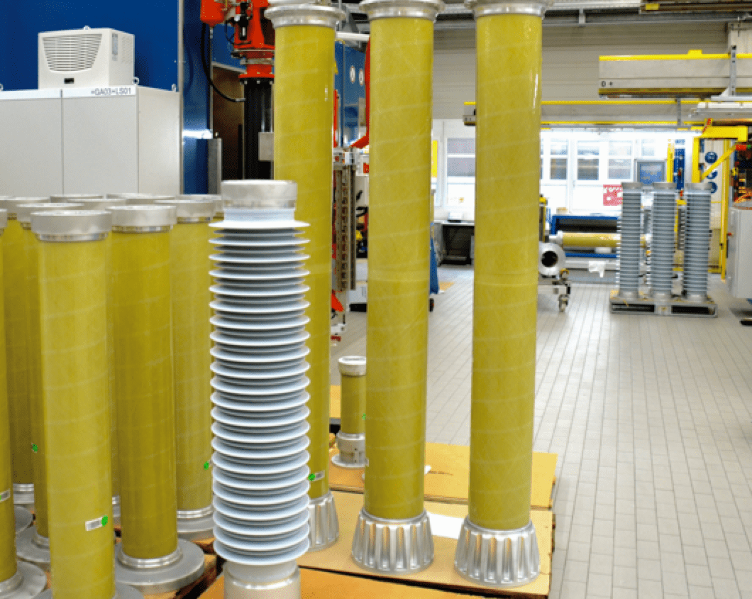 Tubes-with-assembled-flanges-undergo-injection-molding-of-housings Tubes-with-assembled-flanges-undergo-injection-molding-of-housings hollow core composite insulators Manufacturing Hollow Core Composite Insulators Tubes with assembled flanges undergo injection molding of housings