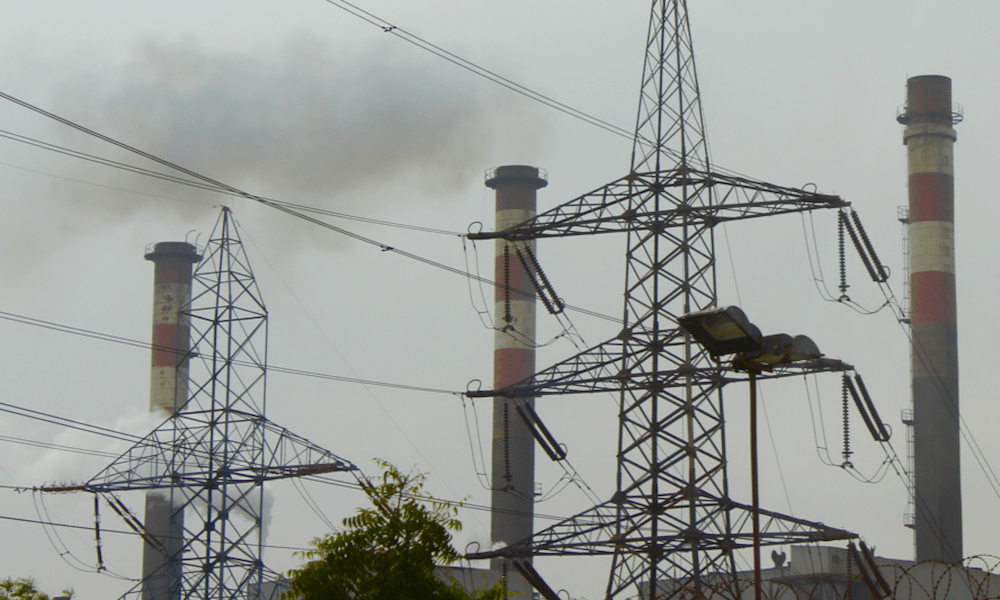 The-area-south-of-Karachi-is-marked-by-heavy-contamination-from-power-plants-and-industrial-sites-and-thick-smoke-is-not-uncommon The-area-south-of-Karachi-is-marked-by-heavy-contamination-from-power-plants-and-industrial-sites-and-thick-smoke-is-not-uncommon Transmission Grid in Pakistan Confronts Dual Challenges of Pollution & Icing (Part 1 of 2) The area south of Karachi is marked by heavy contamination from power plants and industrial sites and thick smoke is not uncommon