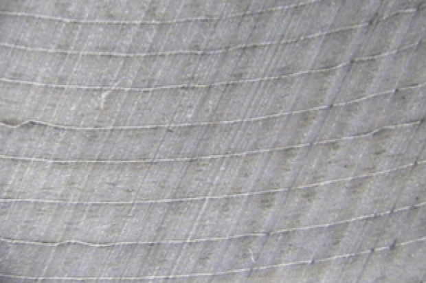 Smooth synthetic material allows for even placing of aluminum foil in RIS bushings