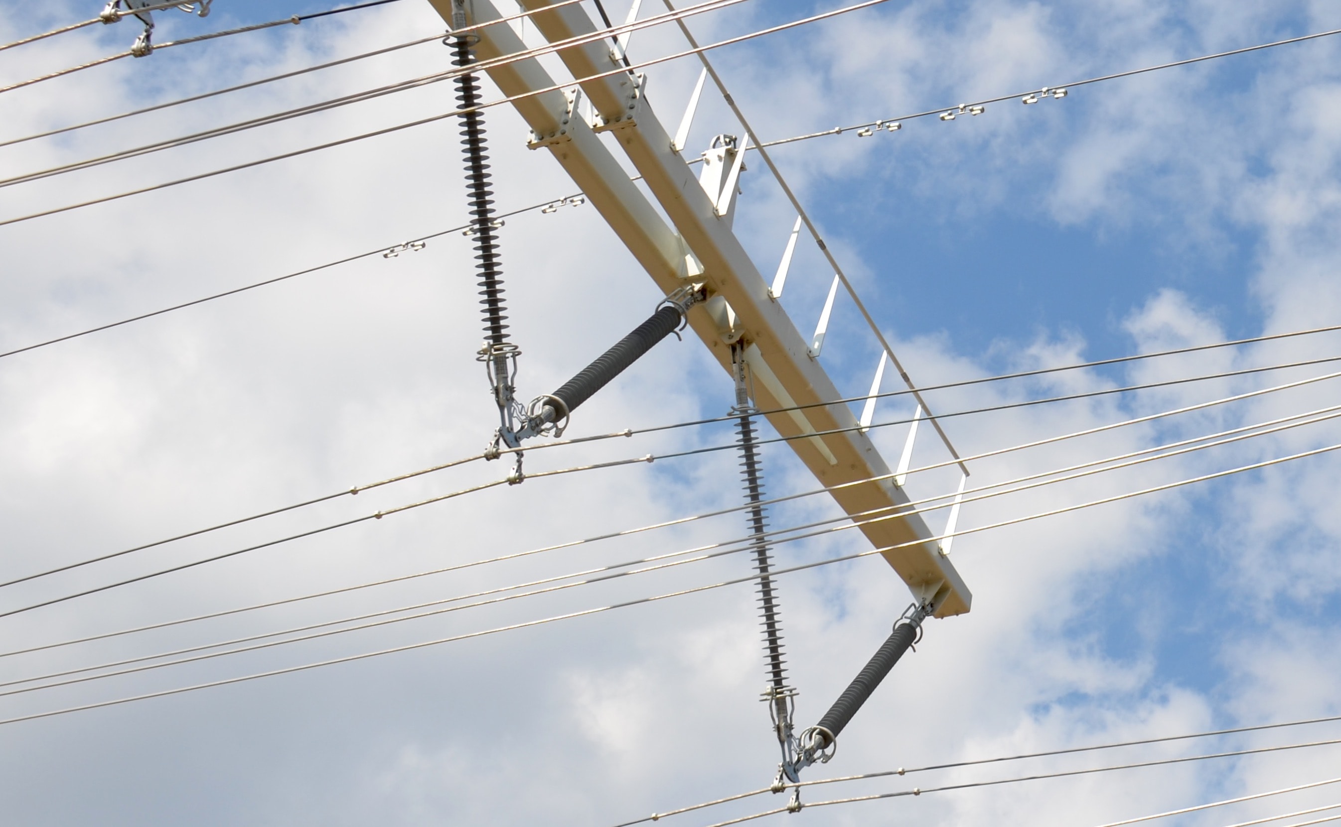 Design Rules for Long Term Reliability of Composite Insulator Strings